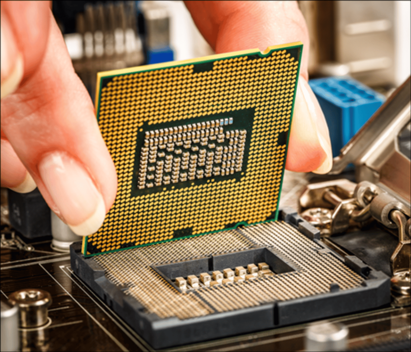 <p>-Does not contain any pins</p><p>-CPU is completely flat</p><p>-All pins are located on the motherboard CPU socket</p><p>-Possible damage to the CPU socket if objects are dropped onto it (pins can bend)</p>