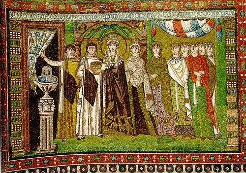 <p>bringing wine for mass. Processing from the Galleryladies of waiting and govt officials (closest to Jesus in composition). ct ladies in patterned silks. Theodora is not overlapped (hierarchy of place) and she has halo of honor. Her robes show royalty giving gifts to christ.</p>