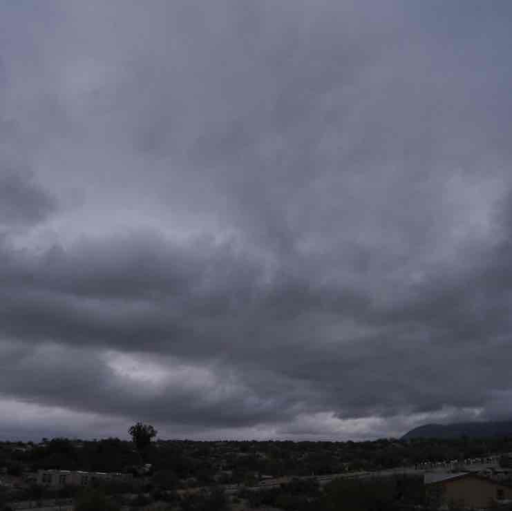 <p>Clouds that form a heavy layer over the sky that blocks out the sun</p>