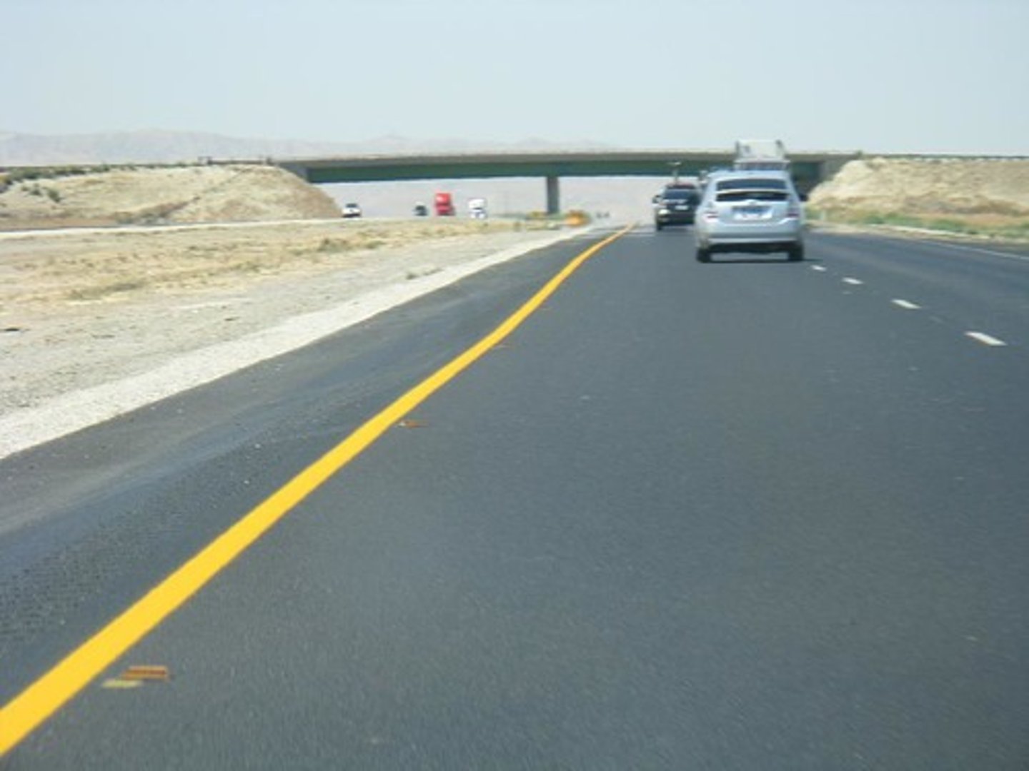<p>"Do Not Pass If the Solid is on Your Side". Marks the road for two-way traffic</p>