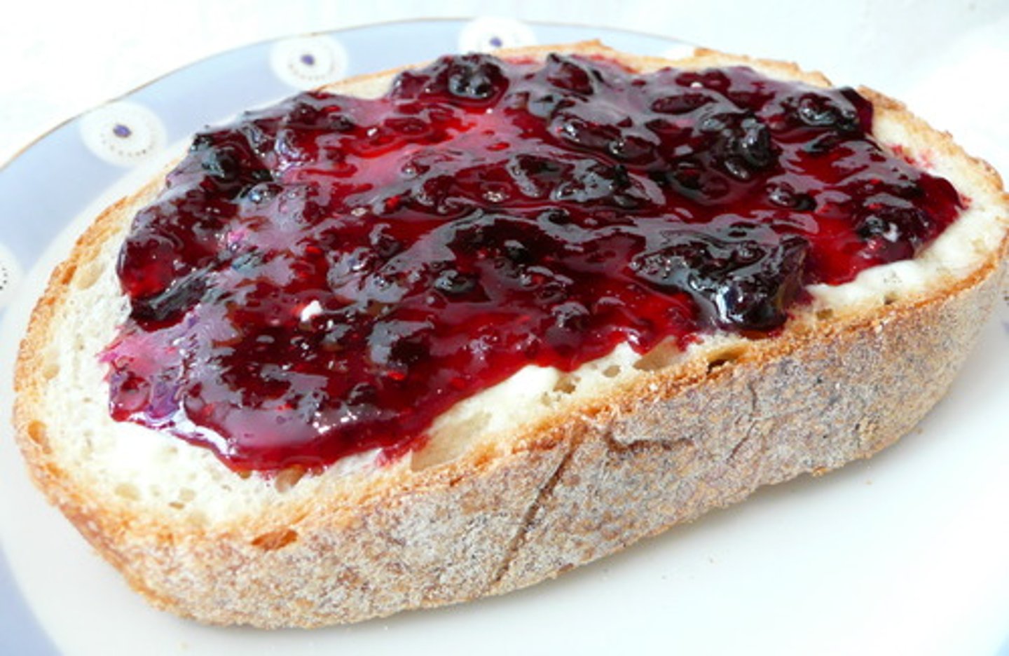 <p>a slice of bread with butter and/or jam</p>