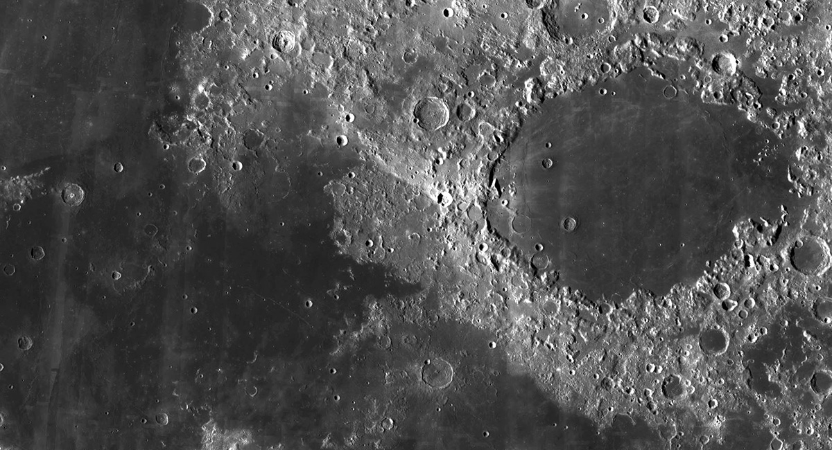 <p><span>On this photo of the Moon, click a part of the Highlands.</span></p>