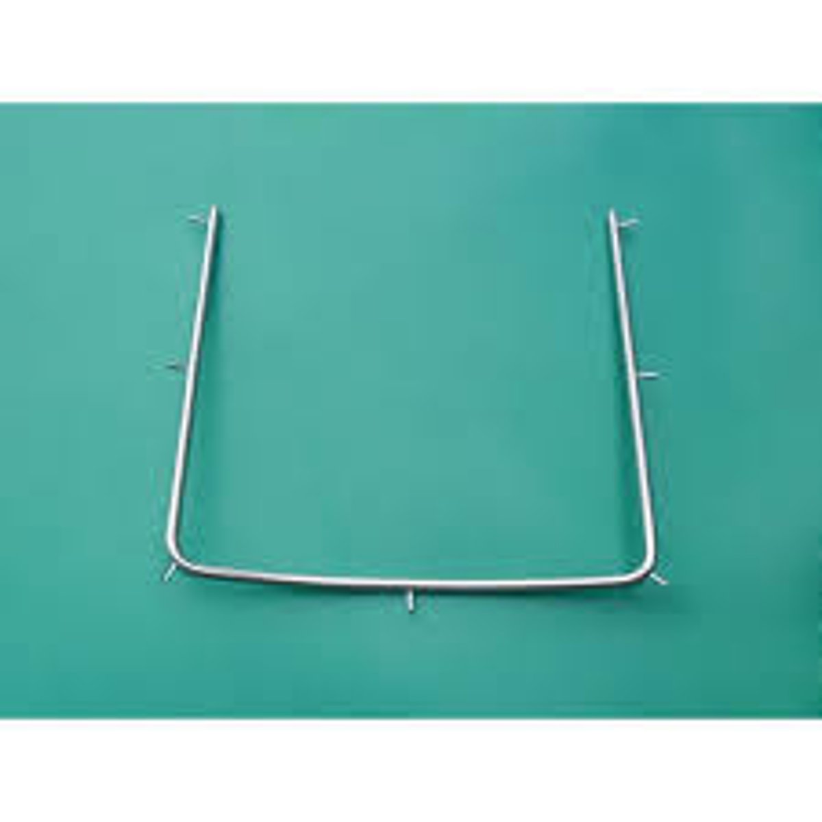 <p>The stainless steel u-shaped holder for a dental dam with little projections on the outside of the frame.</p>