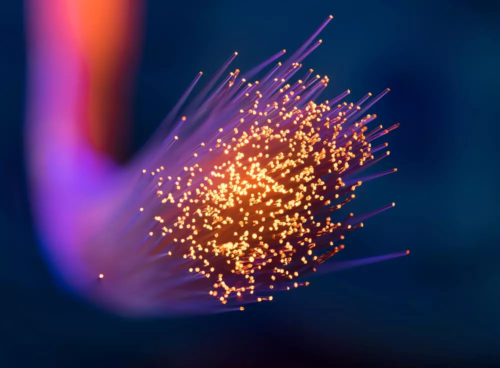 has energy directly proportional to the frequency of its wave.