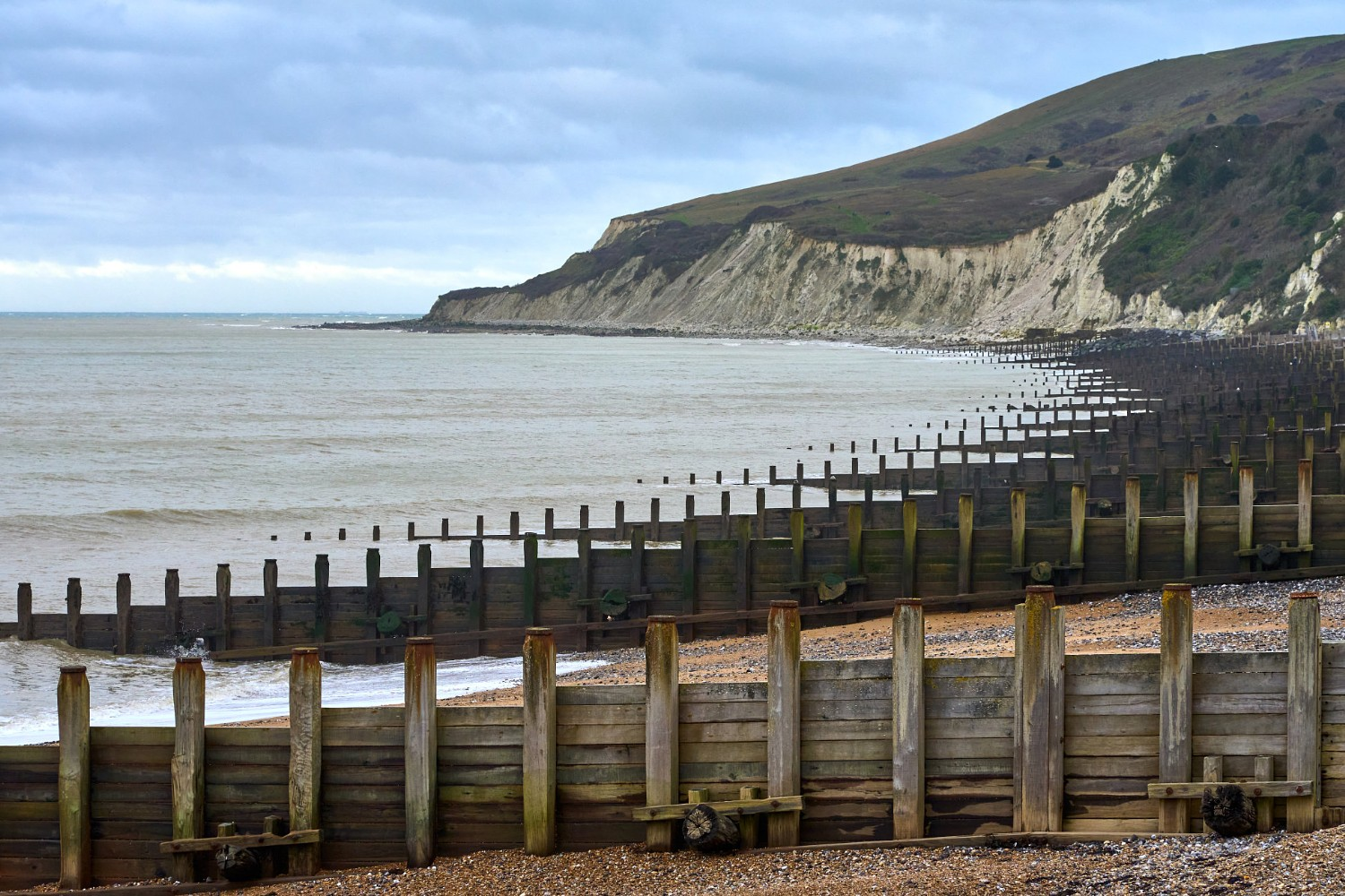 <p><strong><u>Advantage</u></strong></p><ul><li><p>low maintenance</p></li><li><p>creates wider beach - reduces wave energy and can be popular with tourists</p></li><li><p>cheap £150,000 each</p></li></ul><p></p><p><strong><u>Disadvantage</u></strong></p><ul><li><p>starve beaches further along the coats (terminal groyne syndrome)</p></li></ul><p></p>