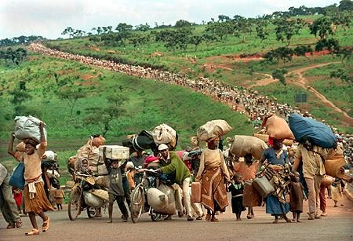 <p>People who flee to another country to escape mistreatment or disaster</p>