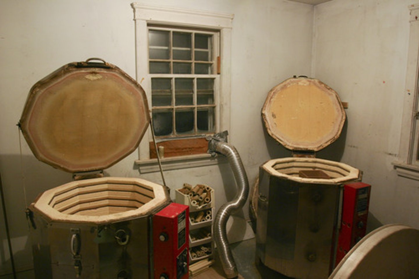 <p>A furnace capable of controlled high temperatures used to fire ceramic ware and sculpture. (It is never safe to open a kiln at any temperature over 200°F.)</p>