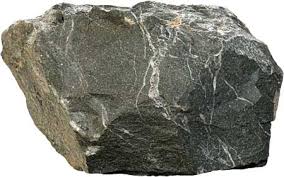 <p>-sedimentary </p><p>-clastic</p><p>-fine to med grained</p><p>-poorly sorted</p><p>-sub-angular to rounded shape</p><p>-quartz, clay</p><p>-f<span>orms from the rapid deposition of mixed sediments, including sand, silt, and rock fragments, in deep ocean environments</span></p><p><span>uses: construction </span></p>