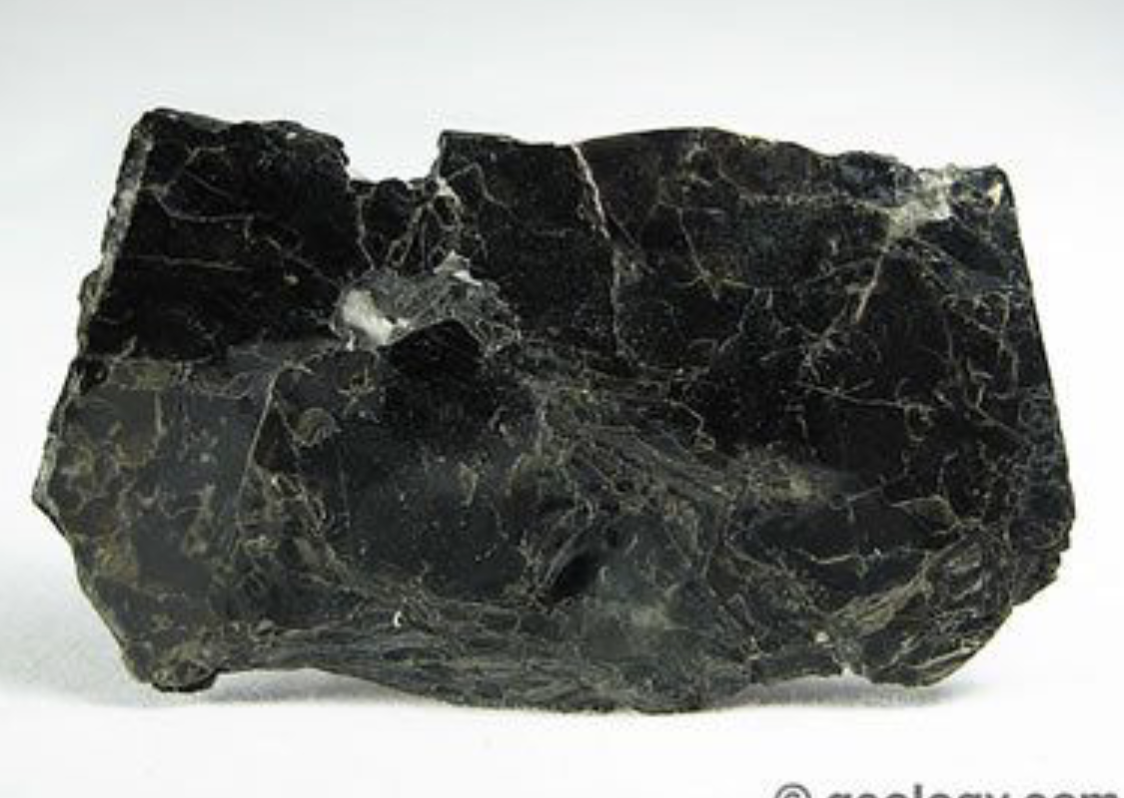 <p>Almost micaceous, darker than mucovite</p>