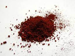 Red brown,insoluble in excess