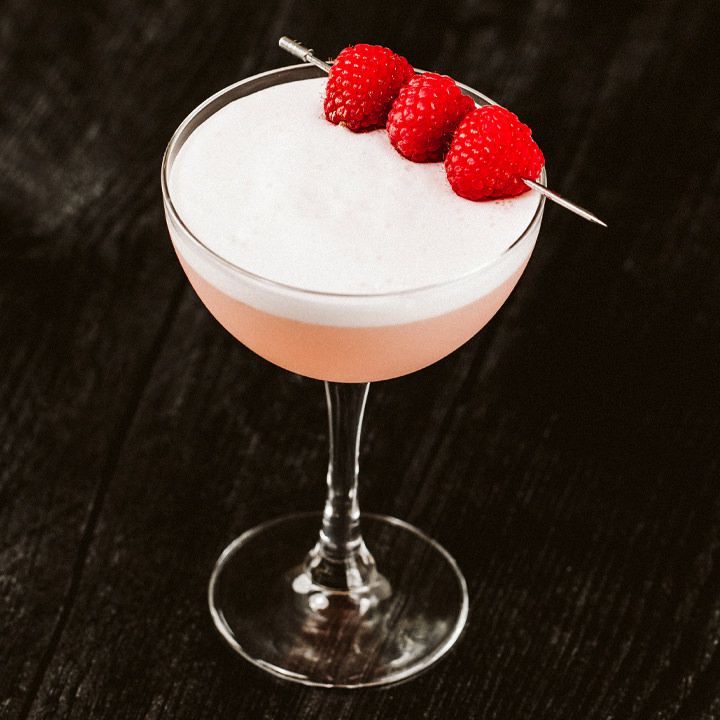 <p>sour, 1.5 oz gin, 0.5 oz Chambord, 0.5 oz simple syrup, 0.5 oz lemon juice, optional egg white, served straight up, no garnish</p>