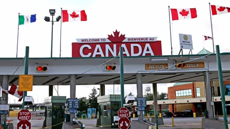 <p>Tim drove to the border between Canada and Minnesota. He was debating whether he should escape the draft and avoid going to war.</p>
