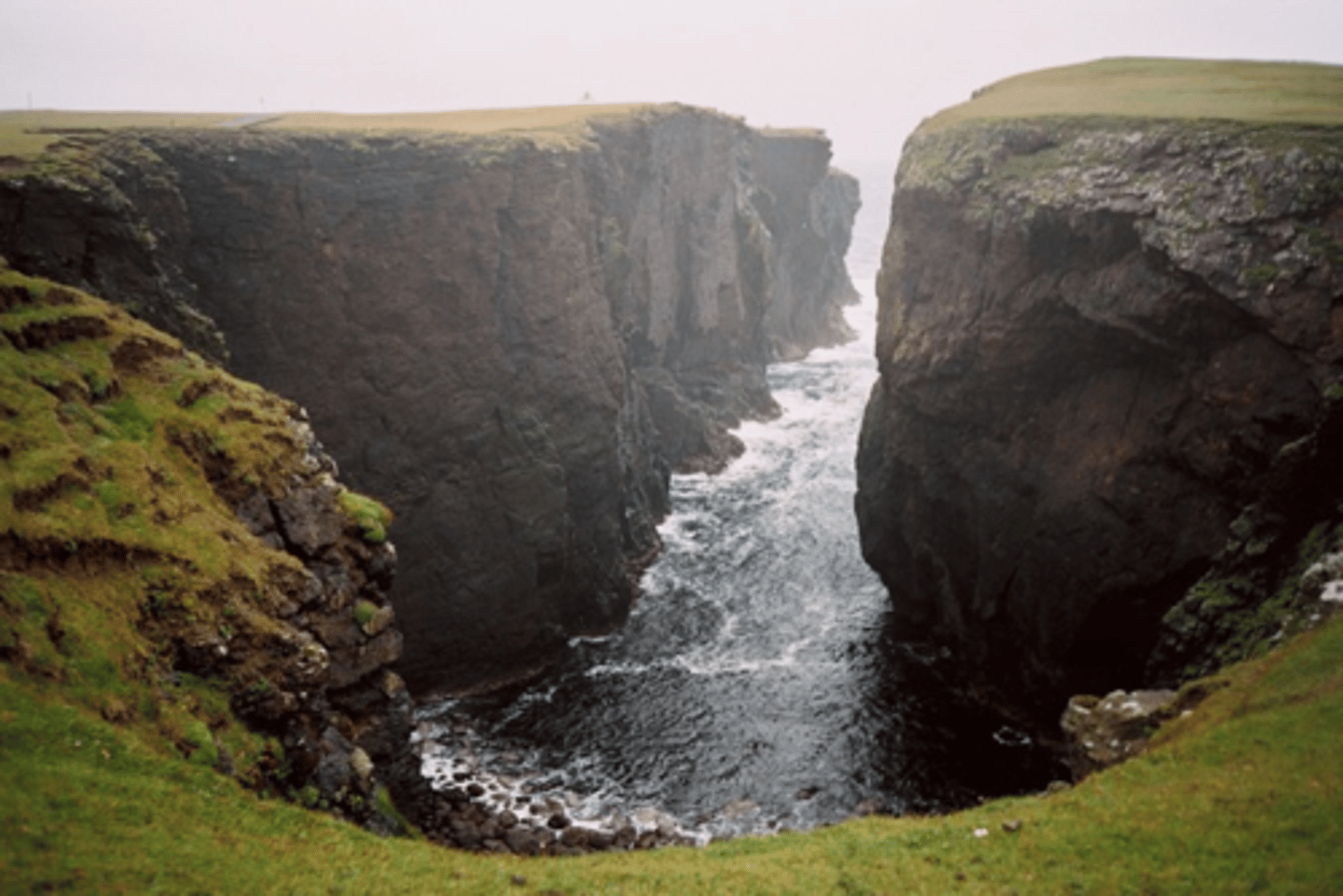 <p>= a specific inlet where there is no difference in geology which has caused the formation of a narrow inlet, only formed from some sort of mass movement or crack in the rocks where one are has slipped away</p>