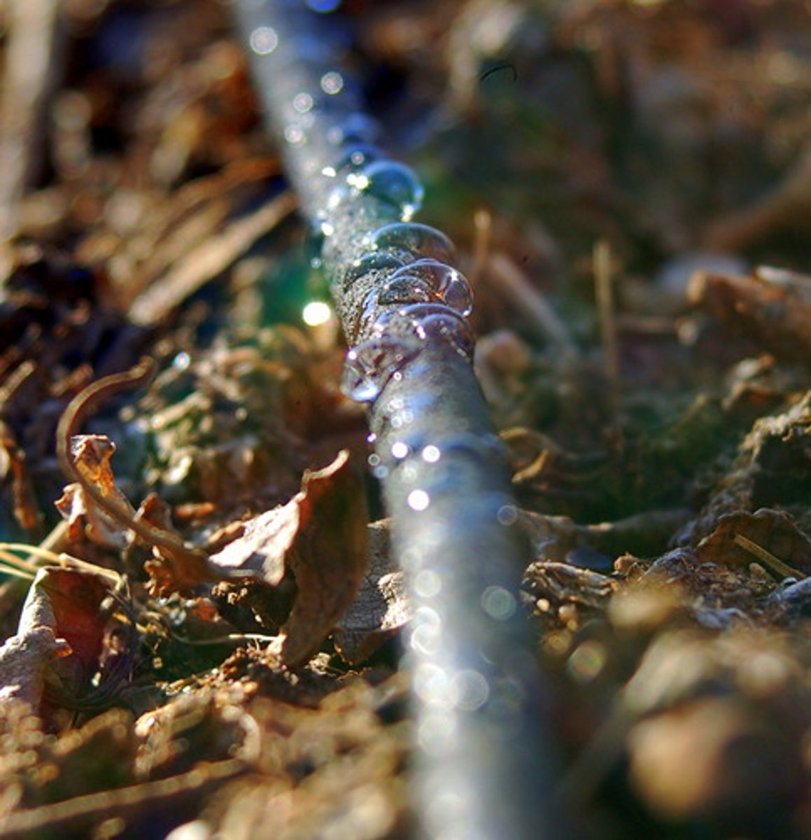 <p>deliver small amounts of water directly to plant roots by using perforated tubing, water is released to plants as needed and at a controlled rate</p>