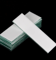 <p>works in the same way as chromatography but the stationary phase (the chromatography paper) is a thin layer of silica or aluminium powder spread over a plate of glass or plastic.</p>