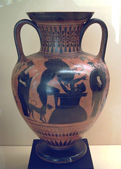 an ancient jar with two handles and a narrow neck