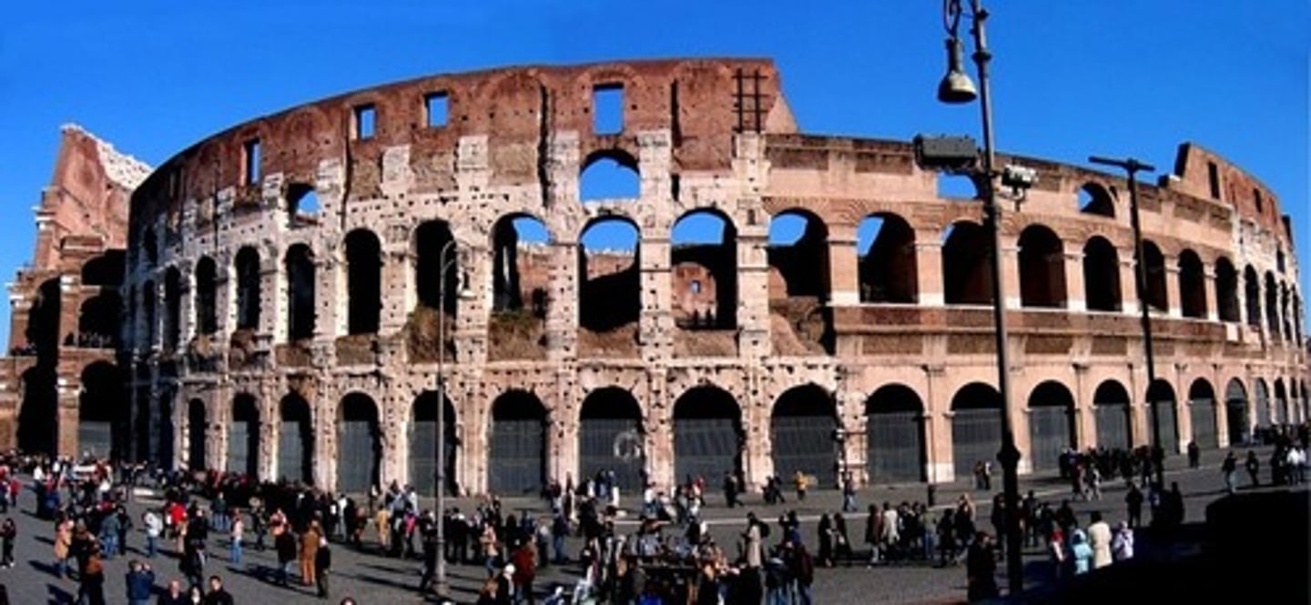 <p>This famous structure was built to host free public sporting events in an effort to distract/calm down this empire’s huge population of poor and oppressed conquered people.</p>