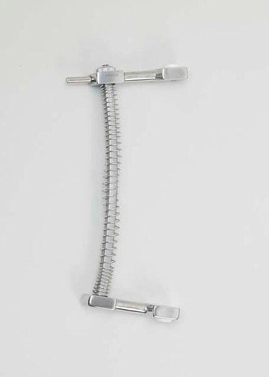 <p>give better exposure of the field in operations on the throat or in the mouth</p>