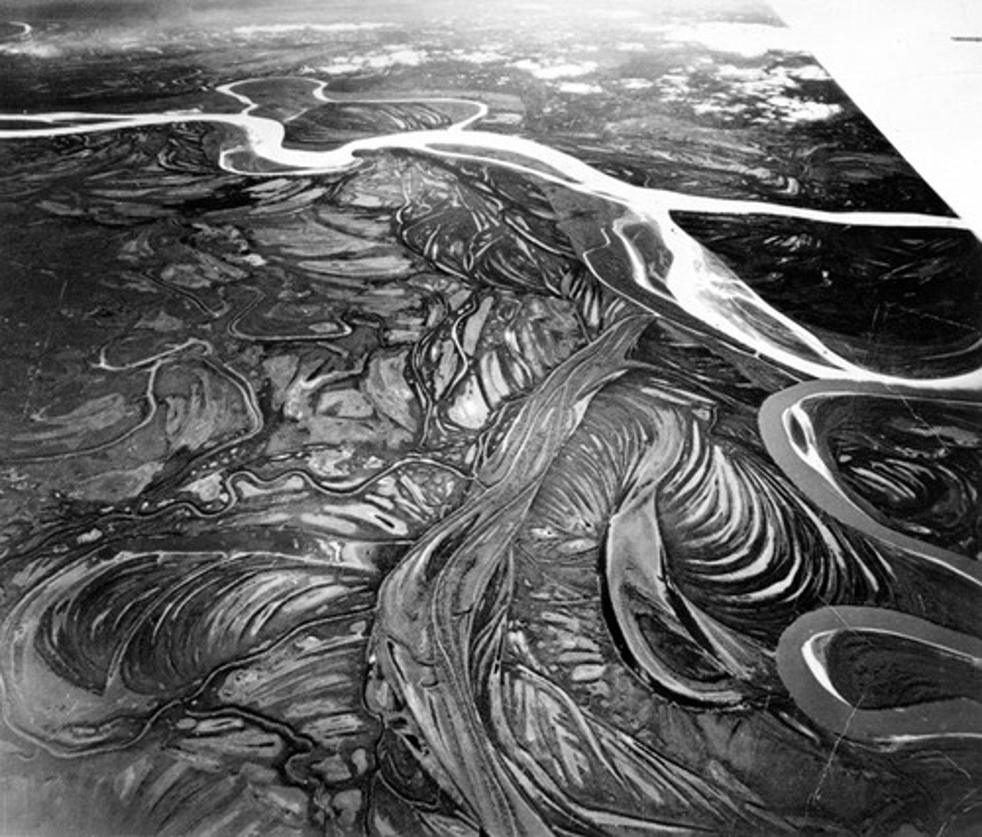 <p>area is fairly saturated and boggy with water such as glacier runoff. Sheet flood can be common</p>