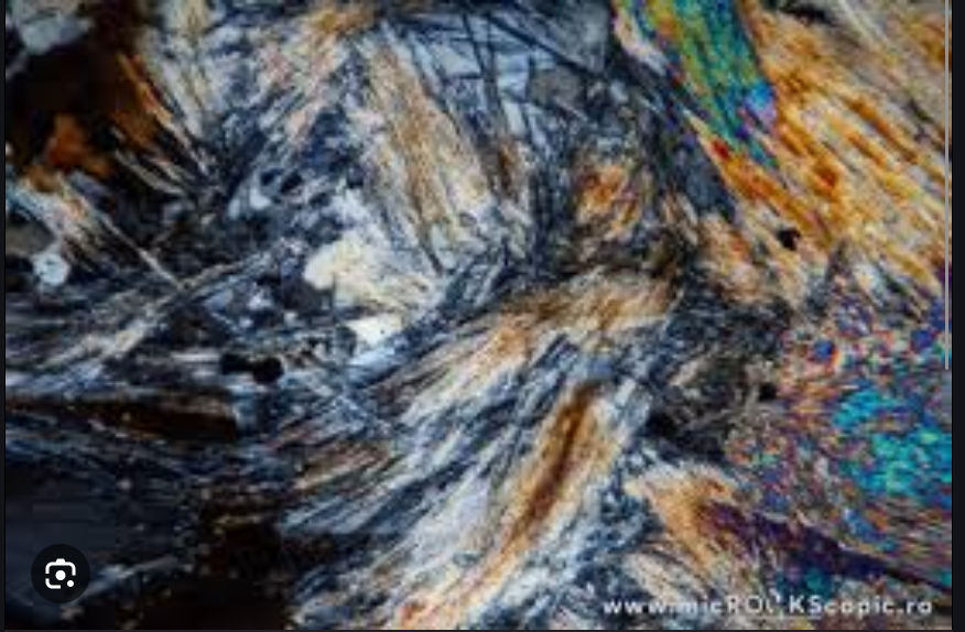 <p>Colorless,1 cleavage plane, high relief, no pleochromism, 1st-2nd orderbirefringence, parallel extinction, no twinning, metamorphic</p>