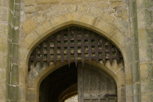 <p>a heavy iron gate</p>