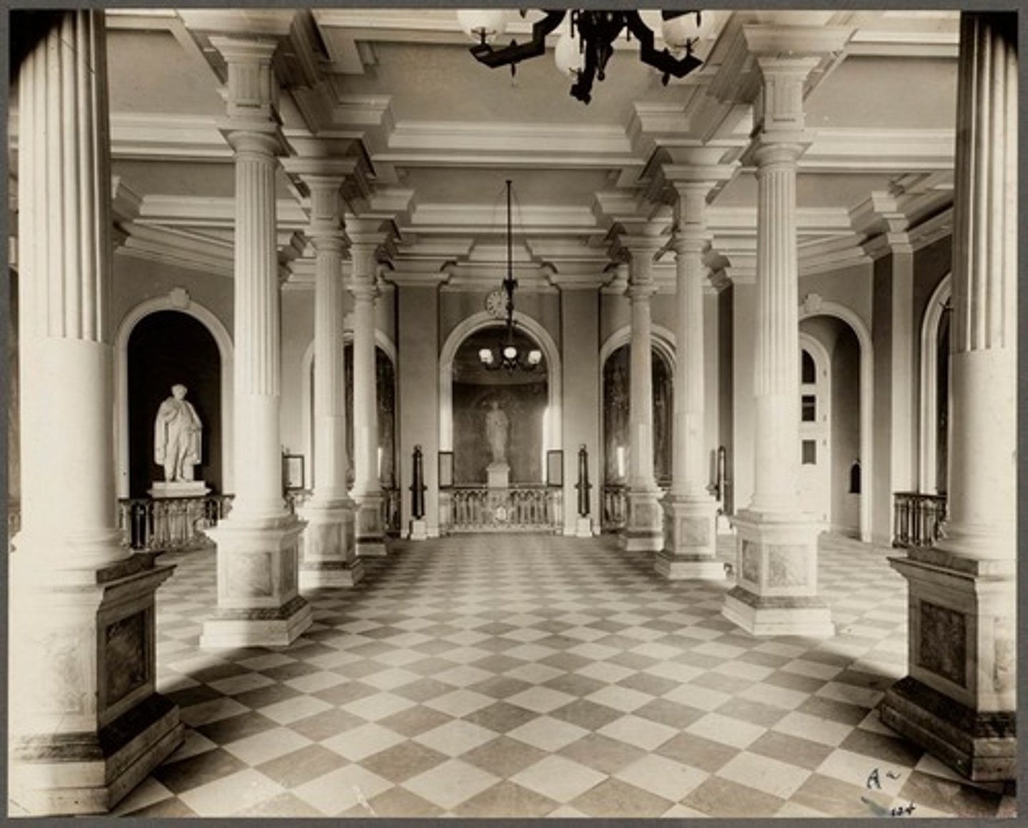 <p>Hall in Massachusetts State House that has doric columns on pedestals with impost blocks but no arch above (should have solid entablature)</p>