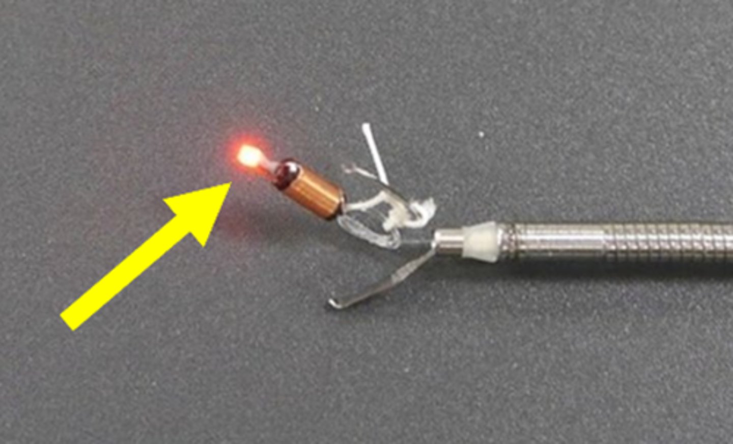 <p>a semiconductor diode that emits light when voltage is applied (like a tiny light bulb)</p>