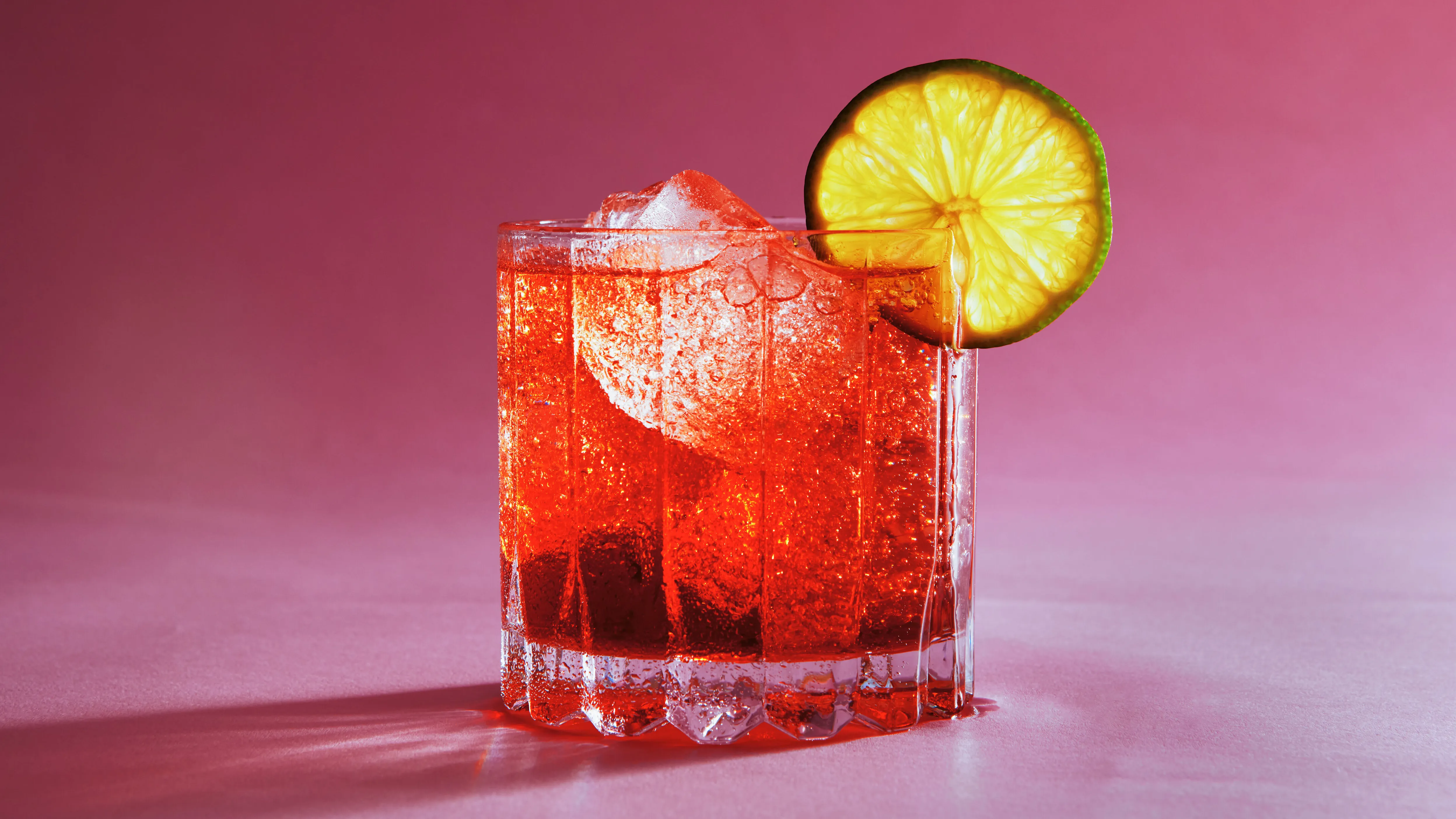 <p>negroni, 1 oz sweet vermouth, 1 oz Campari, top sparkling wine, served on the rocks, garnished with orange peel</p>