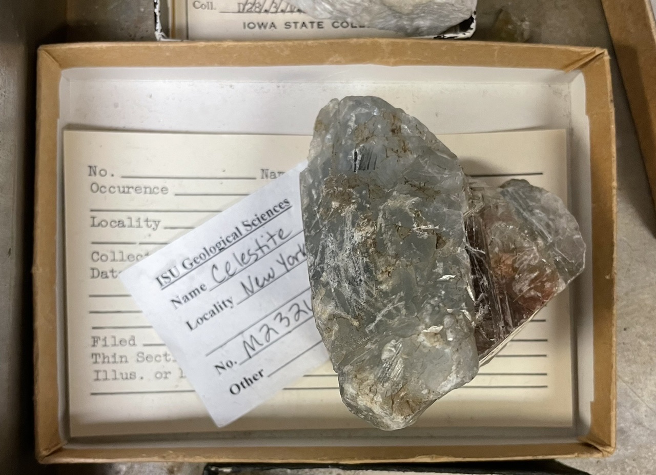hardness 3-3.5, white streak, adamantine vitreous or pearly luster, has cleavage, icy blue color, blocky tabular or prismatic habit