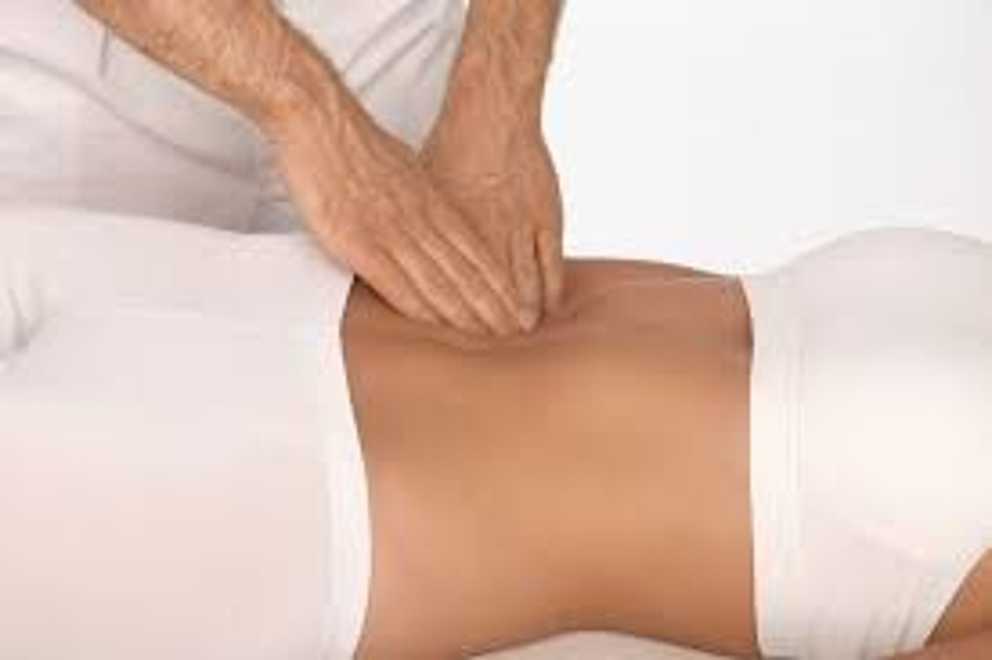 <p>the act of using hands to feel body parts during an exam</p>