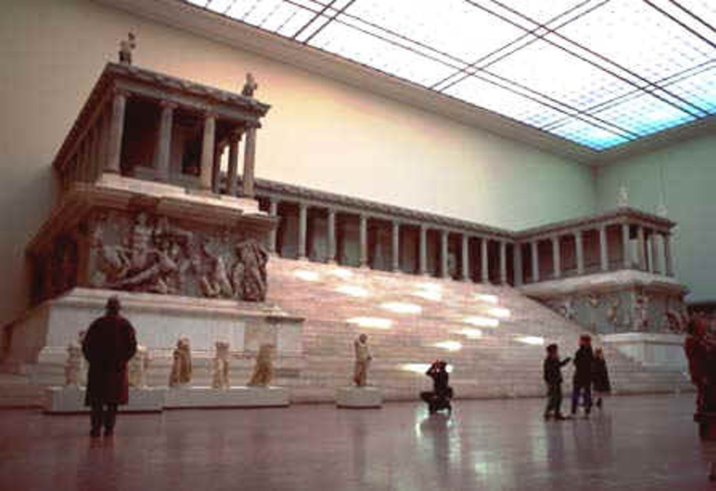 <p>Identifiers</p><p>Dates:</p><p>c. 200-150 B.C.E.</p><p>Places: Asia / West Asia / Turkey</p><p>Period, Culture, Style: Ancient Greek / Hellenistic</p><p>Artwork Type: Architecture</p><p>Material:Marble</p><p>Technique: Carving</p><p>Facts</p><p>Depicting the battle between gods and giants, from miniature engraved gemstones and vase paintings, to over-life-sized architectural sculptures</p><p>The Altar once stood in a sacred precinct on the acropolis of the ancient city of Pergamon, which was ruled by the Attalid dynasty from 282-133 B.C.E.</p><p>The Altar's architectural framework is a monumental Π-shaped structure surrounded by columns and accessed by a grand staircase.</p><p>It functioned primarily as a place for animal sacrifices and religious rites.</p>