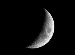 <p>the phase of the moon in which only a curved edge of the moon&apos;s side that faced earth is illuminated, lasts about 6 days, can be a small sliver or almost a quarter moon.</p>