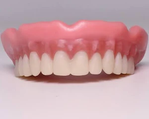 <p>Large, chain-like molecules (plastics/resins) used in things like dentures and fillings.</p>