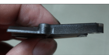 <p>feature of the part (or the whole part) bends as the material cools</p>