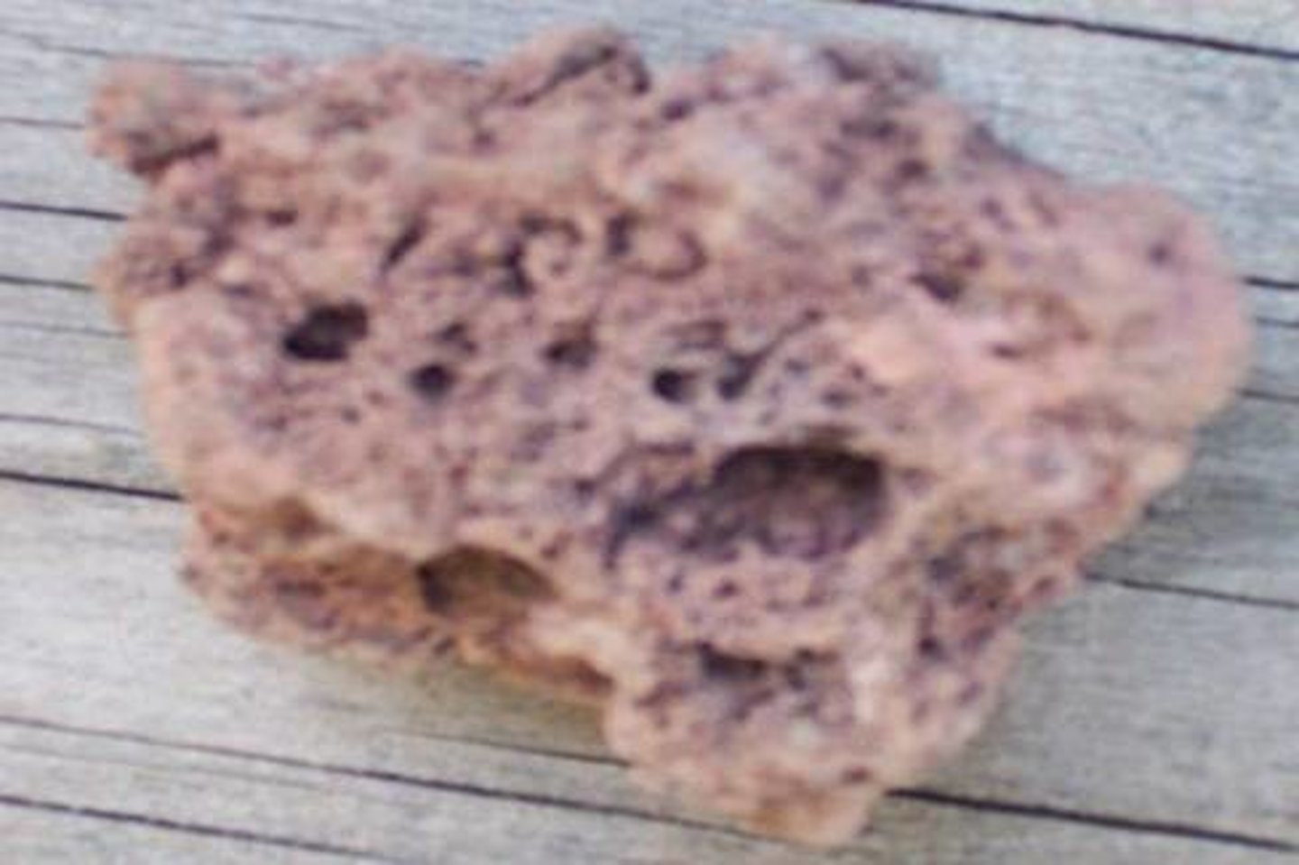 <p>Extrusive Igneous Rock</p><p>Color: medium to dark</p><p>Streak:</p><p>Layers:</p><p>Texture: full of different sizes of air bubbles</p><p>Shiny: dull</p><p>Hardness:</p><p>Other: DOES NOT float in water</p><p>AKA - "Lava rock" often used in landscaping</p><p>similar to pumice, but cooled more slowly</p>