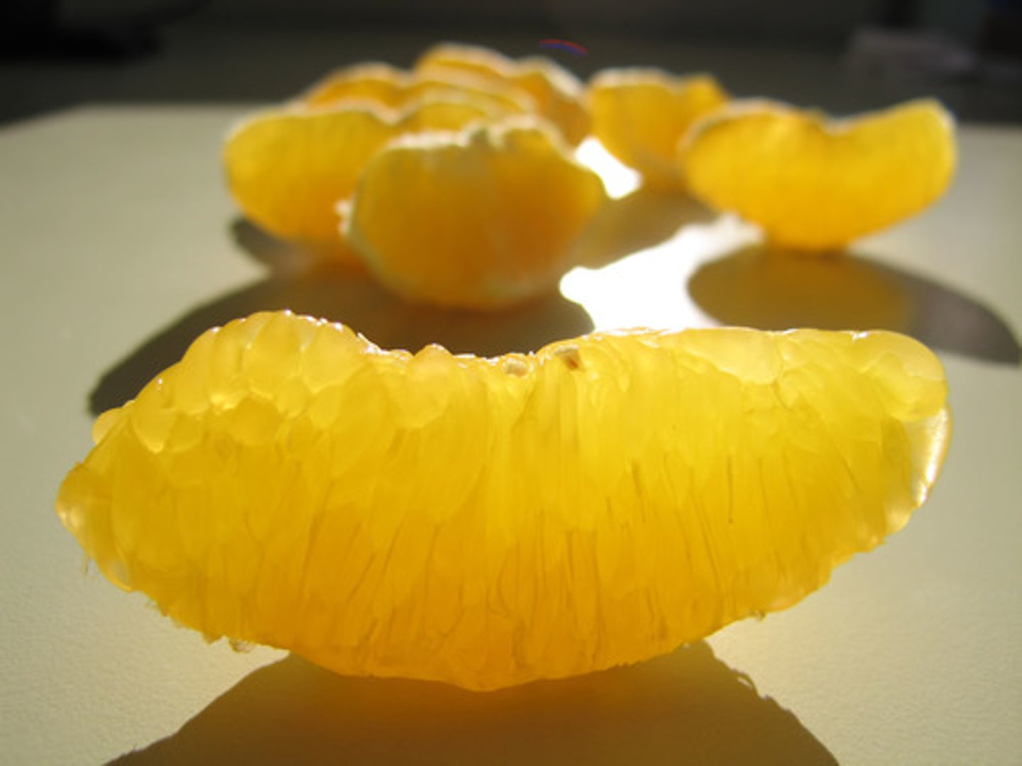 <p>a segment of orange</p>