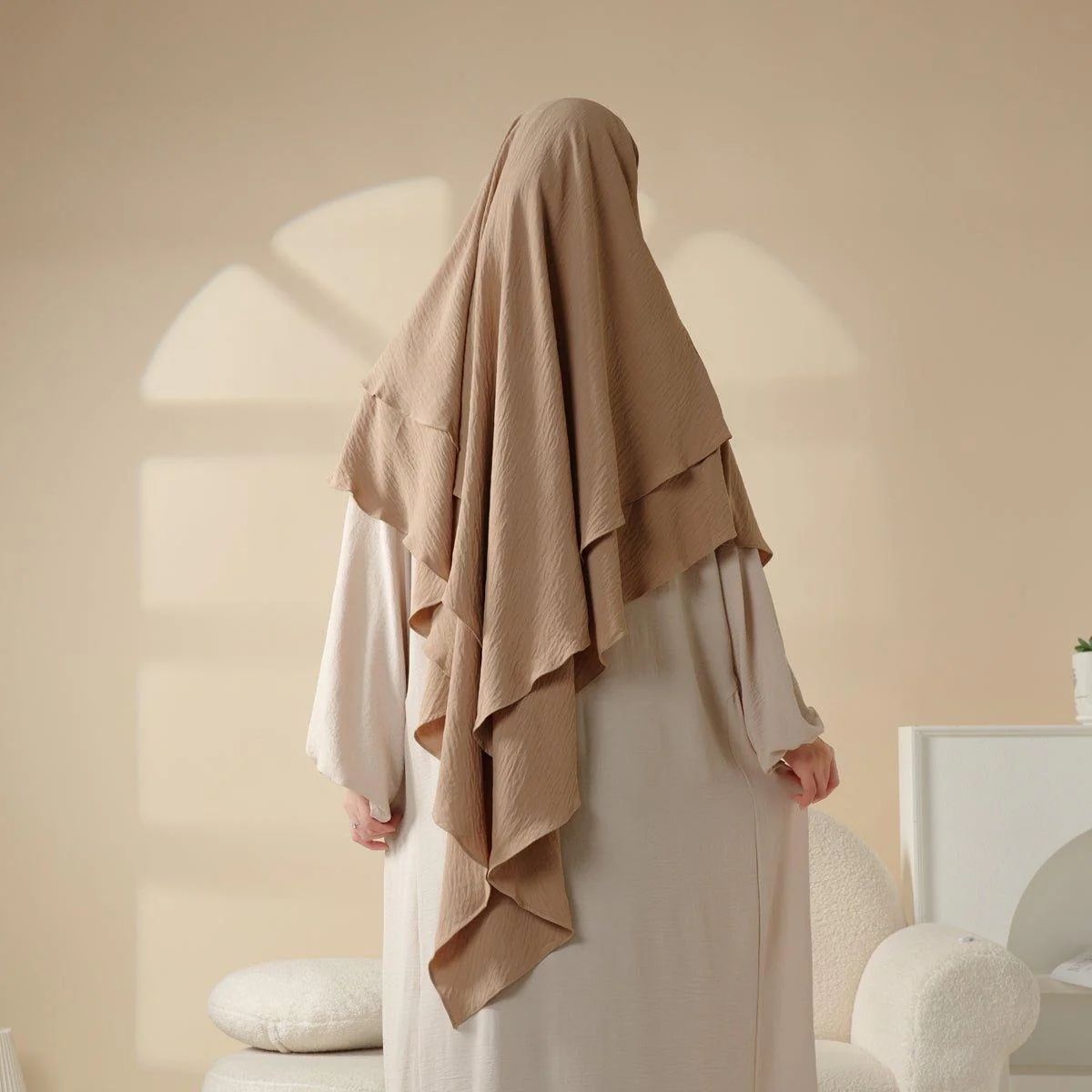 <p>خمار (khimaar)</p>
