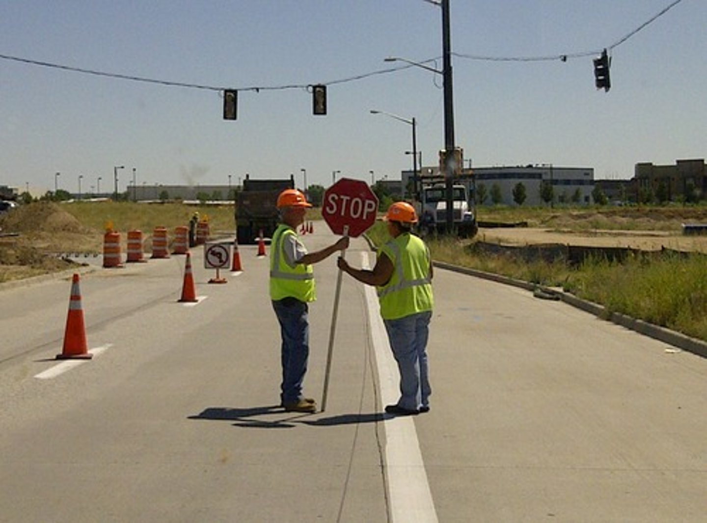 <p>a person, usually a construction worker, who uses flags, signs, or other devices to direct traffic. A flagger's instructions overrule any other laws and traffic control devices.</p>