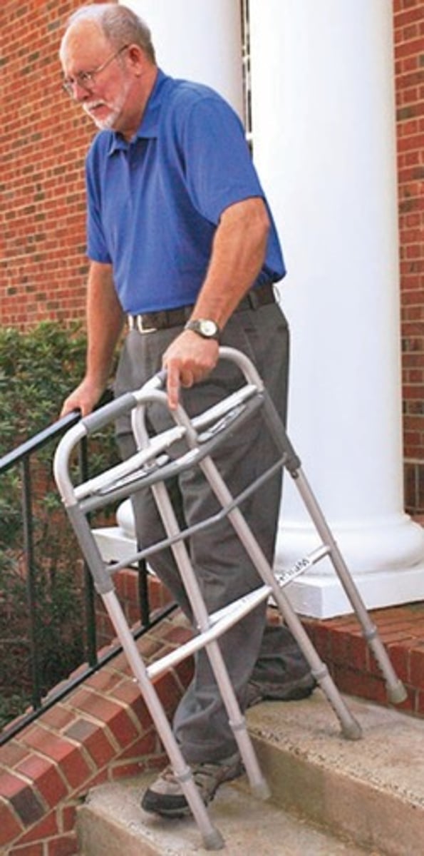 <p>Rail on one side, folded walker on other</p>