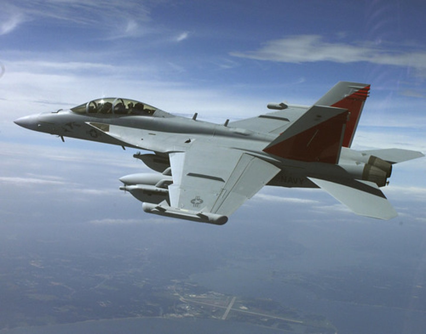 <p>role: electronic attack; carrier based and expeditionary (ground) all weather; replaced EA Prowler; integrates latest electronic attack tech, Active Electronic scanning array (AESA) </p><p>features: 2 seat cockpit, 35% larger fuselage and wing surface area compared to hornet; jamming pods mounted on top of wing tips </p><p>crew: 1 pilot, 1 NFO as Electronic warfare officer (EWO)</p><p>responsibilities: share, </p>