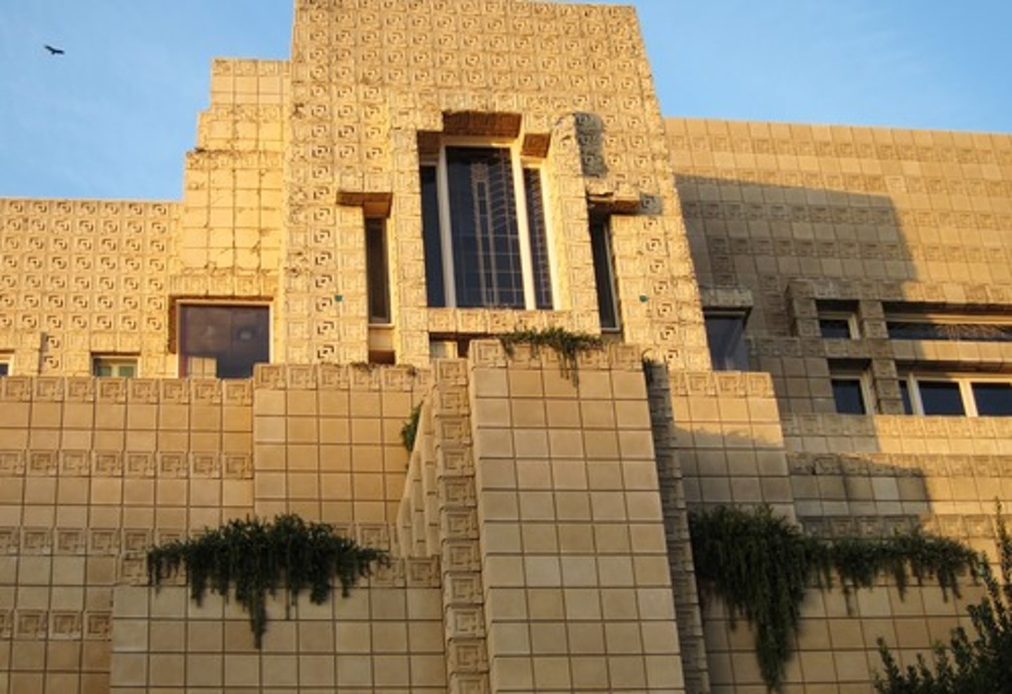 <p>LA Style, Used in movie sets, concrete blocks with textile blocks</p><p></p><p><span style="font-size: unset; color: unset">Massive house, open spaces  </span></p><p>-<span style="font-size: unset; color: unset"> Used in Music Videos and Movies </span></p><p>o<span style="font-size: unset; color: unset"> First Horror Movie: House on Haunted Hill, 1959 </span></p><p>-<span style="font-size: unset; color: unset"> Indigenous material </span></p><p>o<span style="font-size: unset; color: unset"> Concrete for the concrete jungle → since concrete street connects LA </span></p><p>o<span style="font-size: unset; color: unset"> Constructed from molded concrete in textile blocks </span></p><p>o<span style="font-size: unset; color: unset"> Textile Blocks: exterior to interior  </span></p><p><span data-name="black_small_square" data-type="emoji">▪</span><span style="font-size: unset; color: unset"> Molded in concrete with texture </span></p><p><span data-name="black_small_square" data-type="emoji">▪</span><span style="font-size: unset; color: unset"> Repeated pattern squares, geometrics </span></p><p><span data-name="black_small_square" data-type="emoji">▪</span><span style="font-size: unset; color: unset"> Decorative  </span></p><p><span data-name="black_small_square" data-type="emoji">▪</span><span style="font-size: unset; color: unset"> 3D Tiles </span></p><p><span data-name="black_small_square" data-type="emoji">▪</span><span style="font-size: unset; color: unset"> Geometrical clarity </span></p><p><span data-name="black_small_square" data-type="emoji">▪</span><span style="font-size: unset; color: unset"> Open sections were for ventilation  </span></p><p><span data-name="black_small_square" data-type="emoji">▪</span><span style="font-size: unset; color: unset"> Glassed open sections were for lighting </span></p><p><span data-name="black_small_square" data-type="emoji">▪</span><span style="font-size: unset; color: unset"> Mix with stained glass that mediates organic world</span></p>