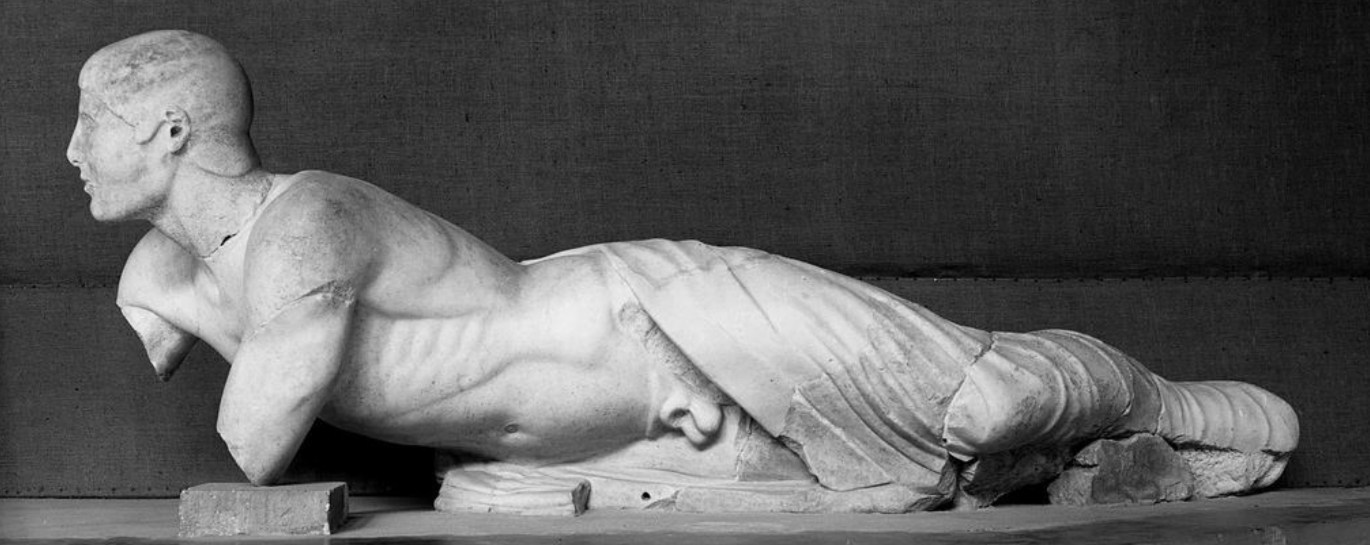 <p>How is detail created on the river god situated on our left of the east pediment?</p>