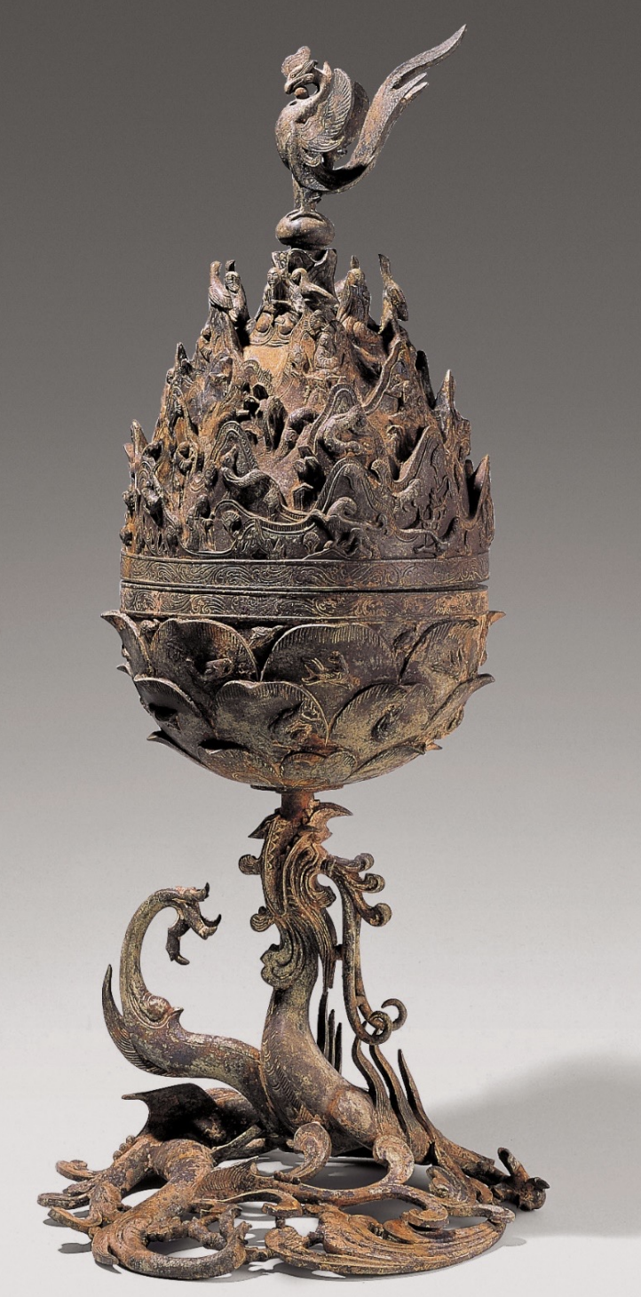 <p>Time: 6th - 7th Century</p><p>Found: Baekje Kingdom in Buyeo, Chungcheong Province (부여군, 충청)<br><br>A ceremonial artifact used in rituals, elaborately designed with intricate motifs, showcasing the sophistication of Baekje metalwork and both Deoist and Buddhist influence. </p>