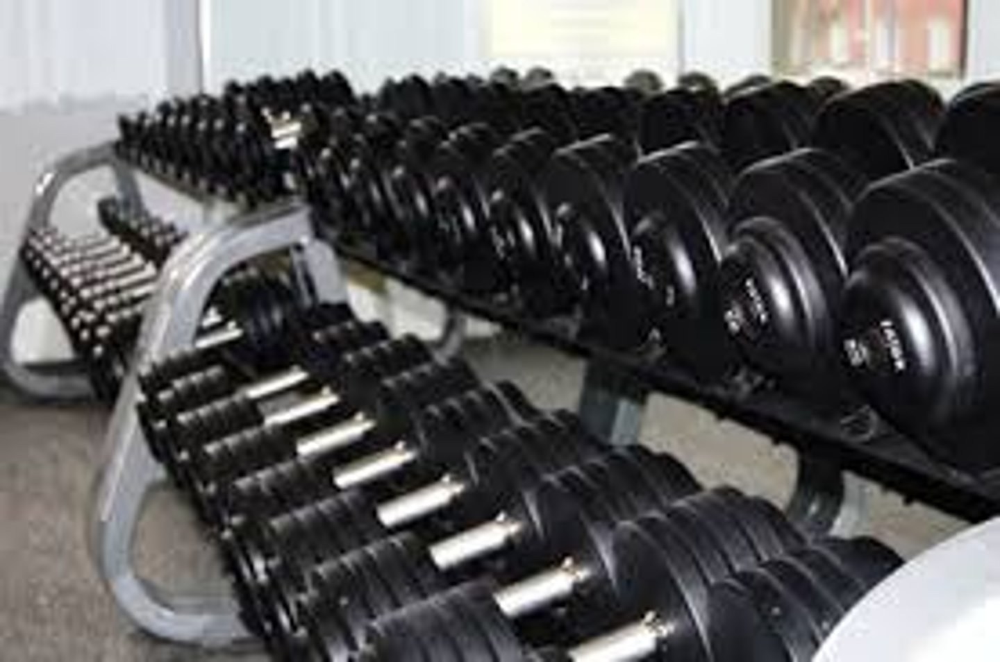 <p>heavy pieces of metal that you lift up and down to make your muscles stronger</p>