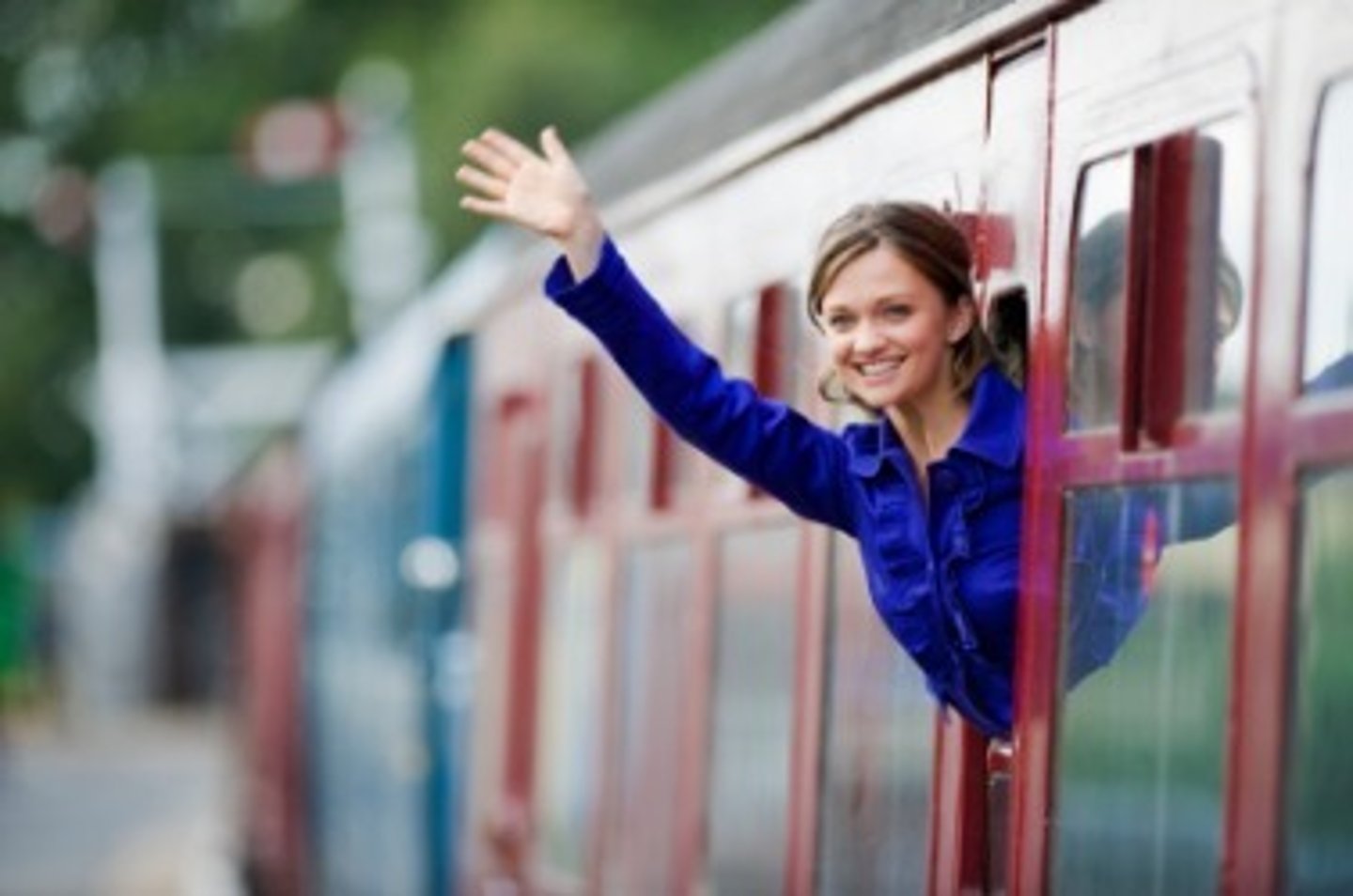 <p>to raise your hand and move it from side to side as a way of greeting someone</p>