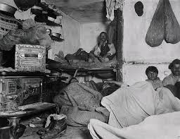 <p>The photograph MOST LIKELY shows—</p><p>A. Urban tenements.</p><p>B. Rural life for immigrants.</p><p>C. The typical lifestyle of Robber Barons.</p><p>D. None of the above.</p>