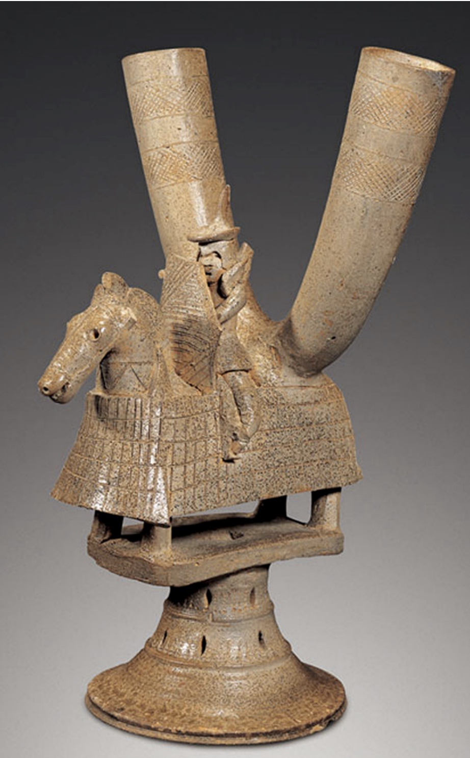 <p>Time: 5th-6th Century</p><p>Found: Gaya Kingdom; Gimhae, Geyongsang Province (김해, 경상)</p><p></p><p>Depicts a warrior on horseback, symbolizing military strength and cultural significance; scale armor using leather strings; (different warrior scultures showed class at this time because some showed elaborate clothes while others shows less elaborate clothes)</p>