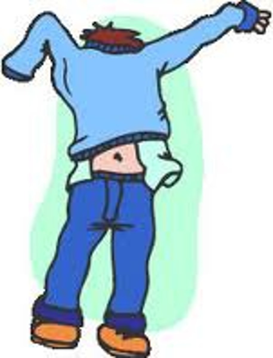 <p>He is dressing himself.</p>