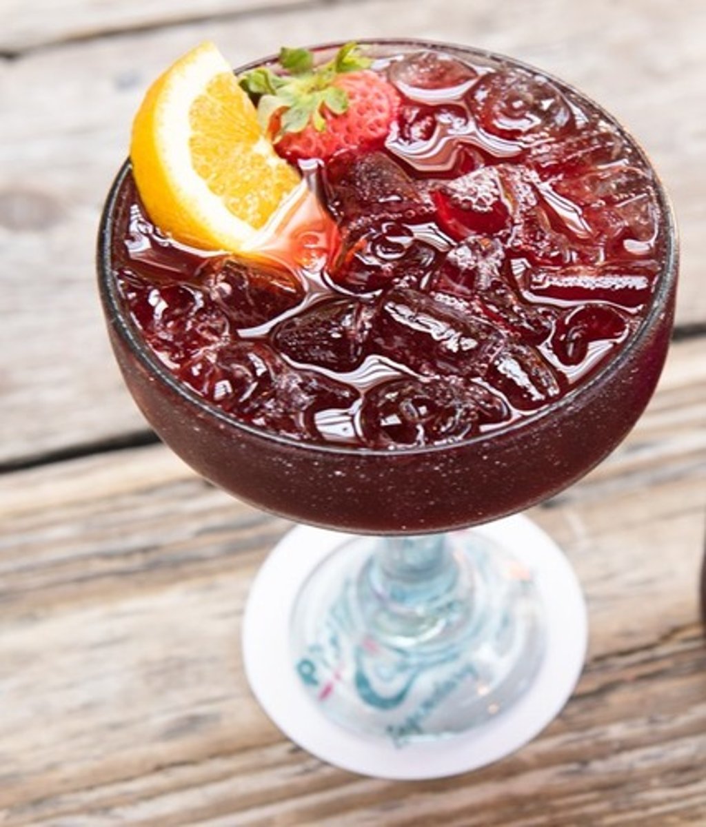 <p>Pappasito's Signature Sangria</p><p>- Red wine infused with fresh fruit</p><p>Garnish: Orange slice, whole strawberry</p><p>Flavor profile: Sweet and fruity</p><p>Selling description: Our signature sangria crafted with red wine and fresh juices.</p><p>** Not available at airport locations.</p>
