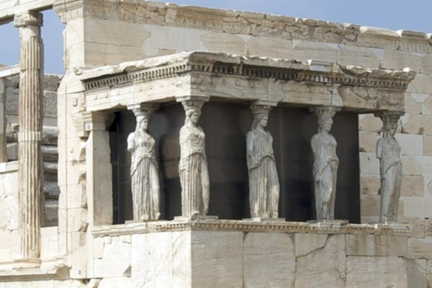 <p>a building column that is shaped like a female figure</p>
